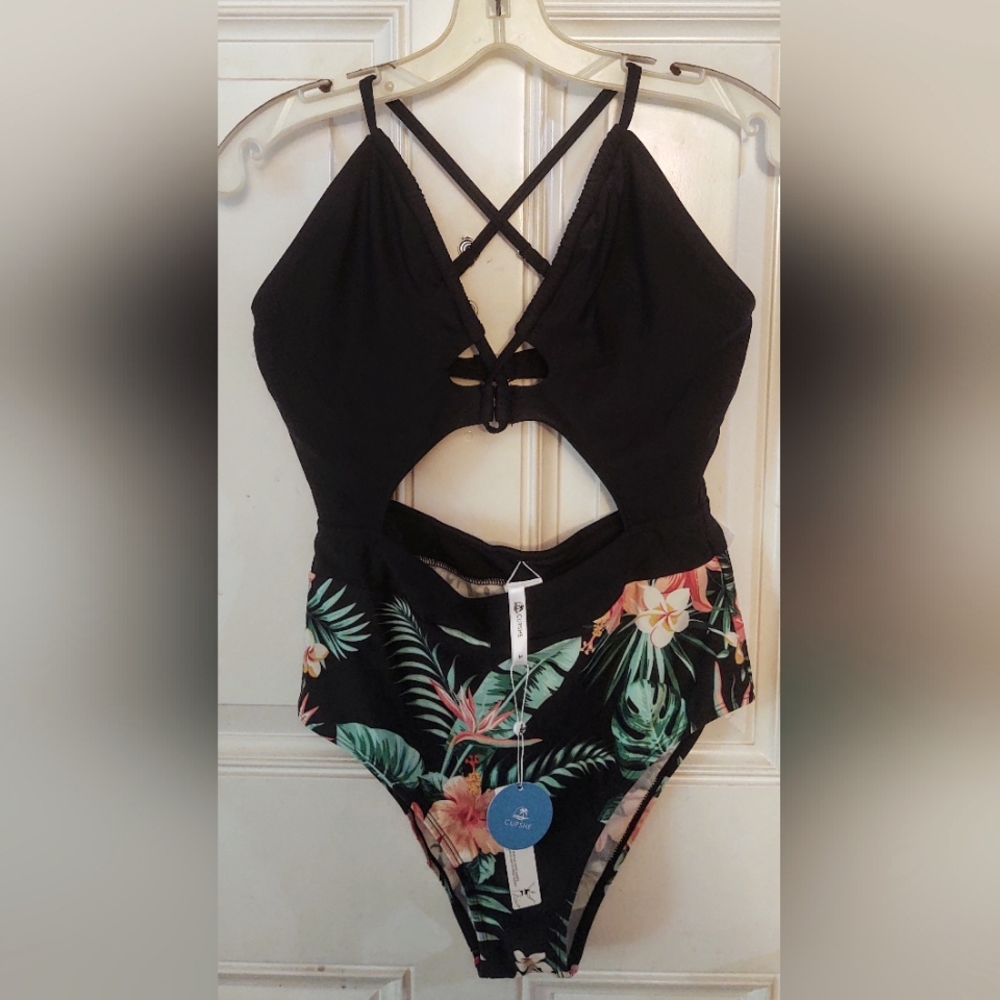 New with Tags, Cupshe One Piece tropical Swimsuit with cutouts.